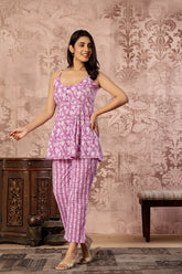 Pink printed cotton co-ord set featuring a spaghetti kurti and straight pants by Rouhab, styled for casual and festive occasions.