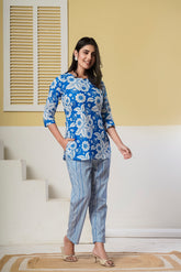 Blue floral printed cotton co-ord set featuring a kurti and straight pants from Rouhab.