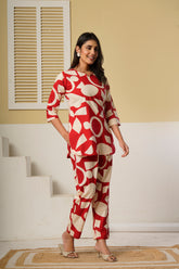 Red geometric printed cotton co-ord set featuring a kurti and straight pants by Rouhab, stylish and comfortable ethnic wear.